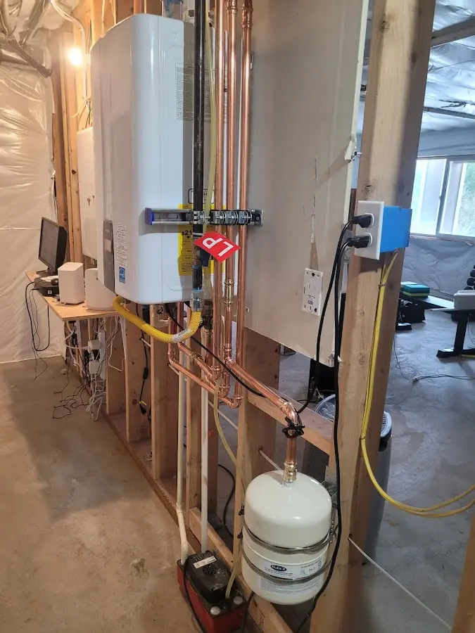 Licensed plumber repairing a kitchen sink in Doffing